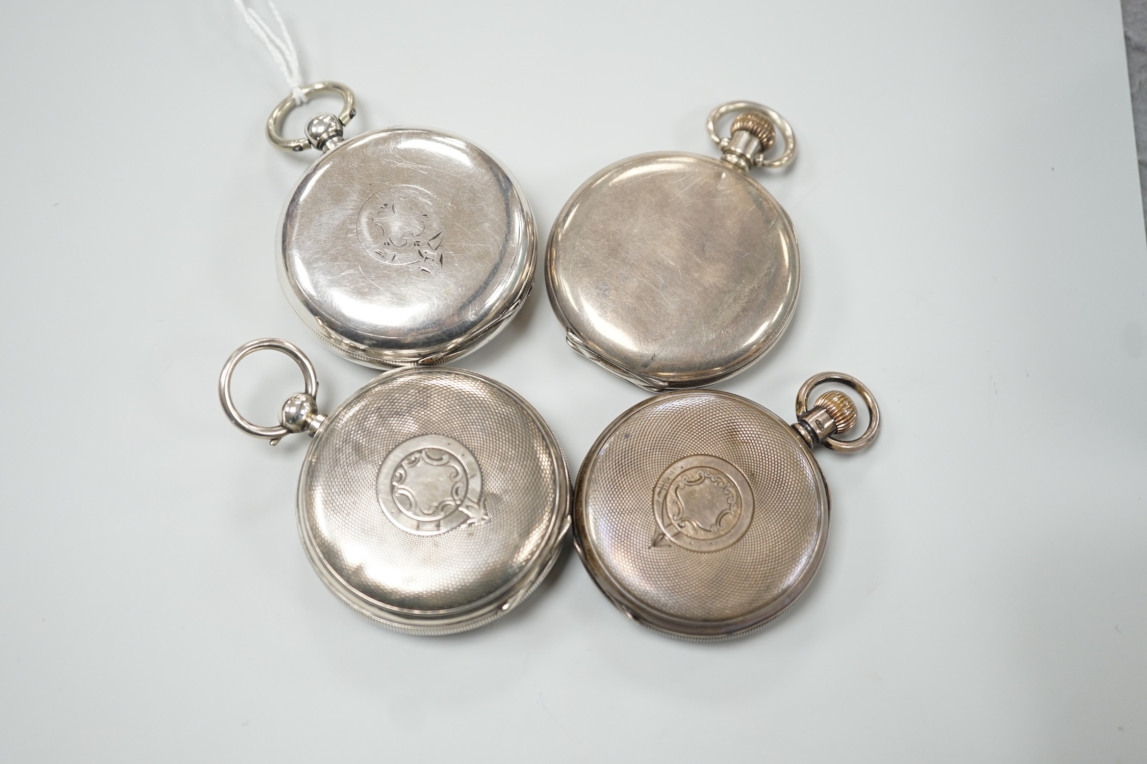 Three assorted Victorian and later silver open face pocket watches, including keywind and keyless and a silver hunter pocket watch.